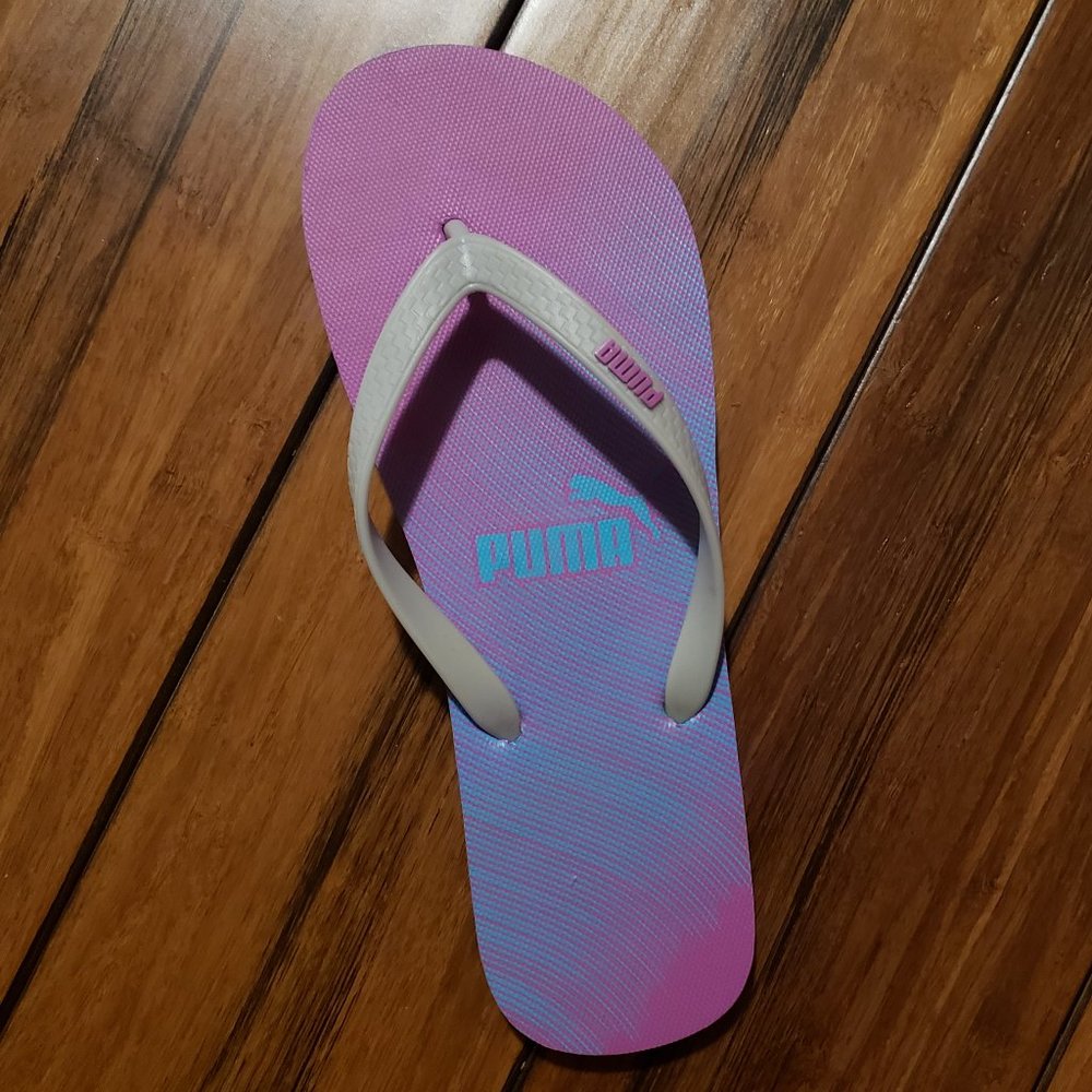 Brand new Puma flip flops size 9